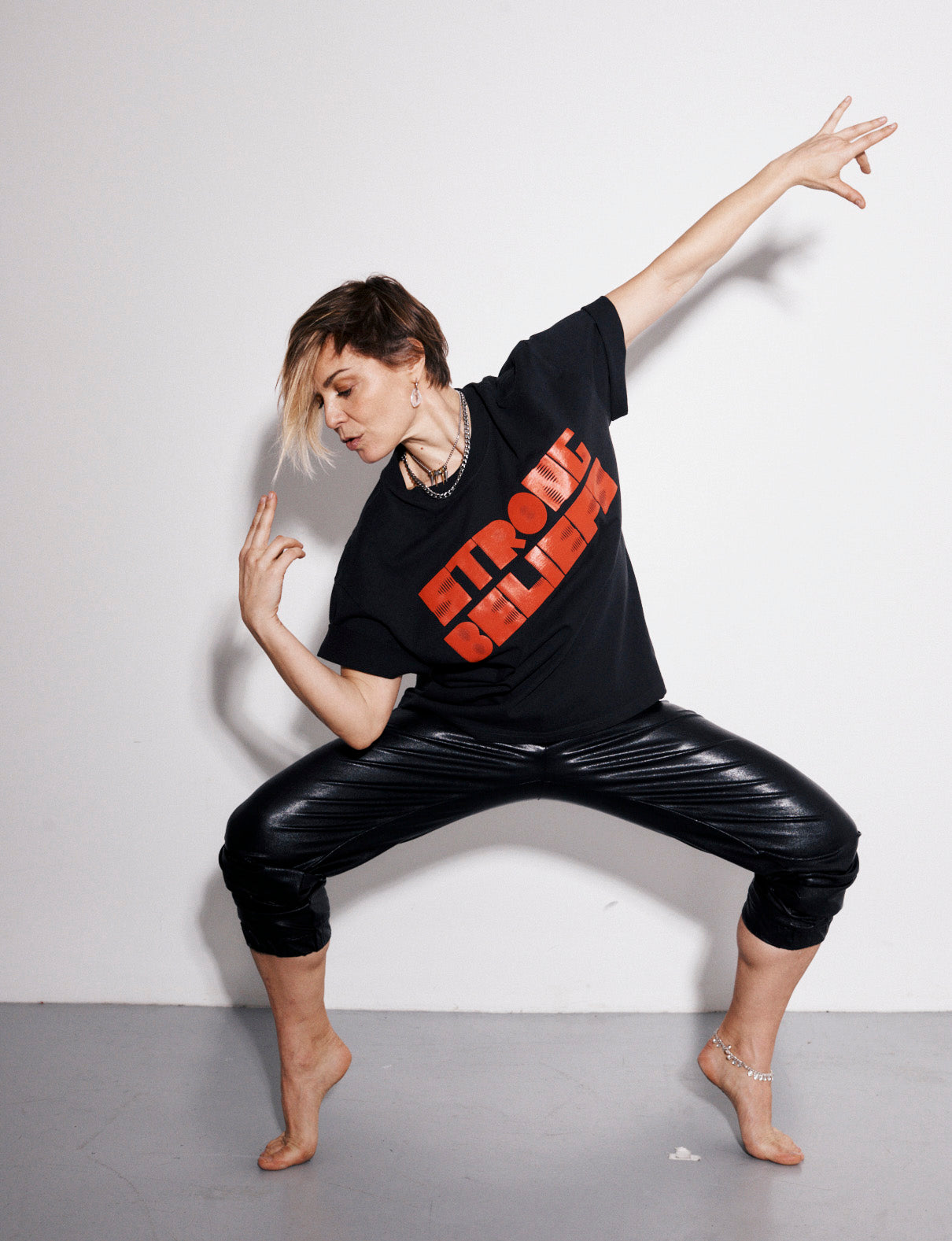 "STRONG BELIEFS TEE"